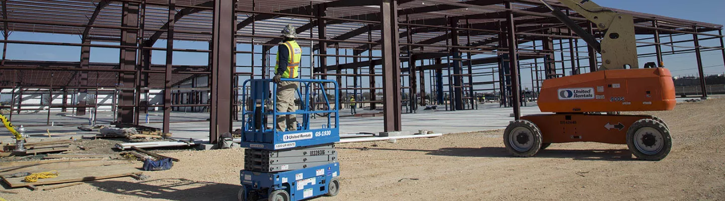 Worker inside lift at jobsite
