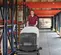 Gray and black NILFISK Walk-behind Floor Scrubber, 32 in., 12V Electric Powered