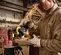 Yellow and black and silver DEWALT Angle Grinder, 4-1/2 in., Cordless, Electric Powered