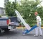 Blue and silver GENIE Material Lift, 700-1,000 lbs., 6 ft.-12 ft., Manual
