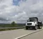 White and Black Freightliner Dump Truck