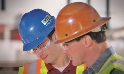 two men in hard hats