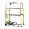 Side view of a silver and yellow mobile scaffold with guardrails.
